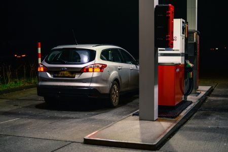 CAR AT GAS STATION